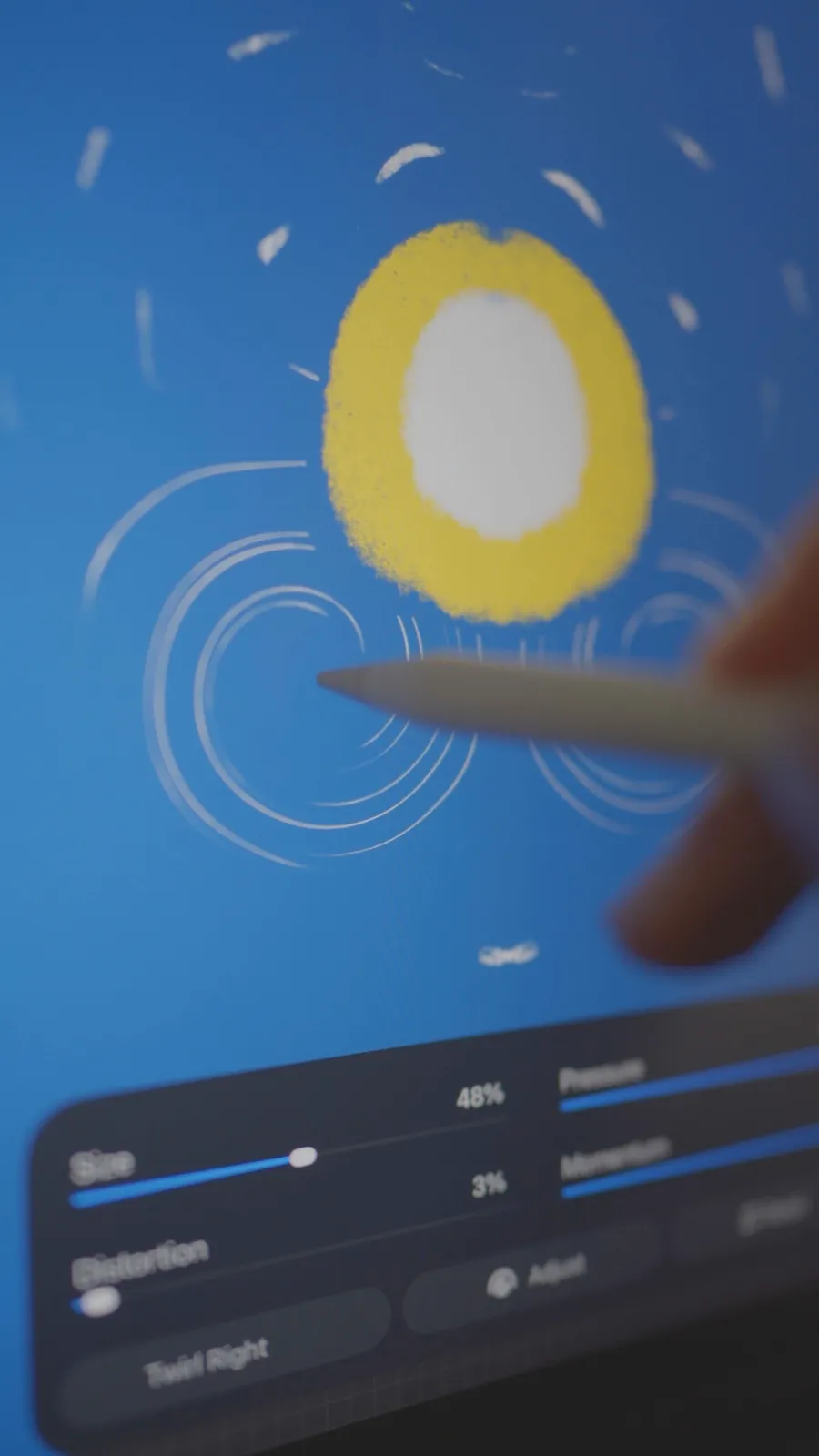 Procreate brush settings open while painting a glowing moon