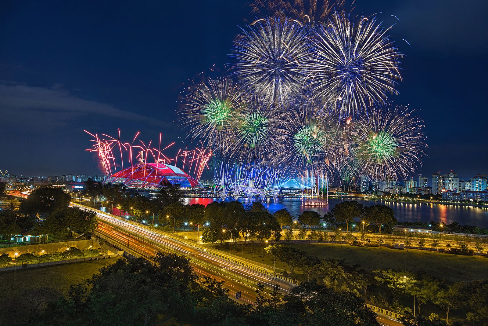 City-wide fireworks finale across the Singapore skyline and highway
